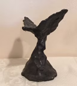 Black Bird — dark sculpture of a bird taking flight